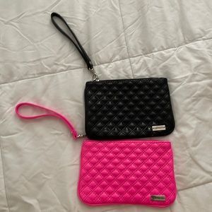 Express black and hot pink patent wristlet